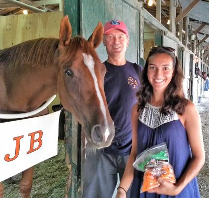 Harbour Way, pictured with co-owners Michelle P and Bob K, after morning training at Monmouth Park on August 8, 2018