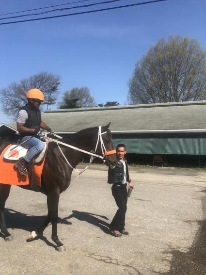 OBS April purchase Hip 542 Congrats filly pictured with Paco Lopez at Monmouth Park (Kelly Breen)